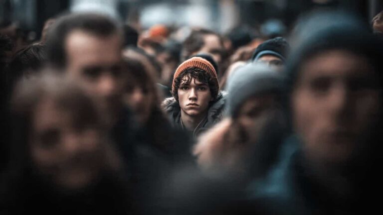 Why Do People Behave Differently in Groups? - PsychoPeak